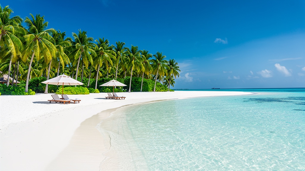 Dry season Maldives beach with clear sky and calm lagoon