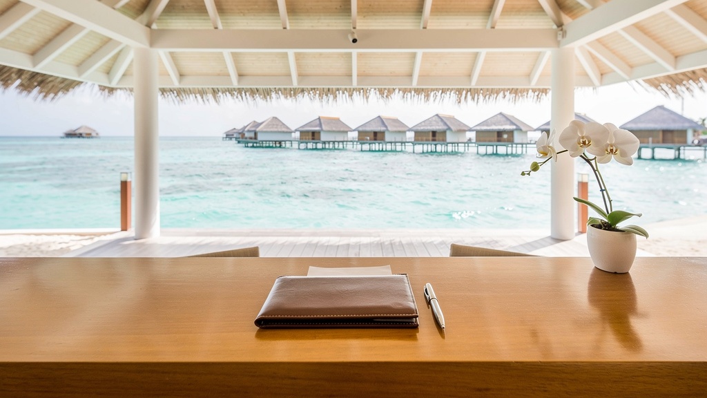 Resort checkout desk with bill folder